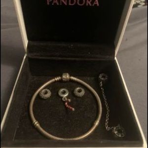 Pandora bracelet with security chain and three beads